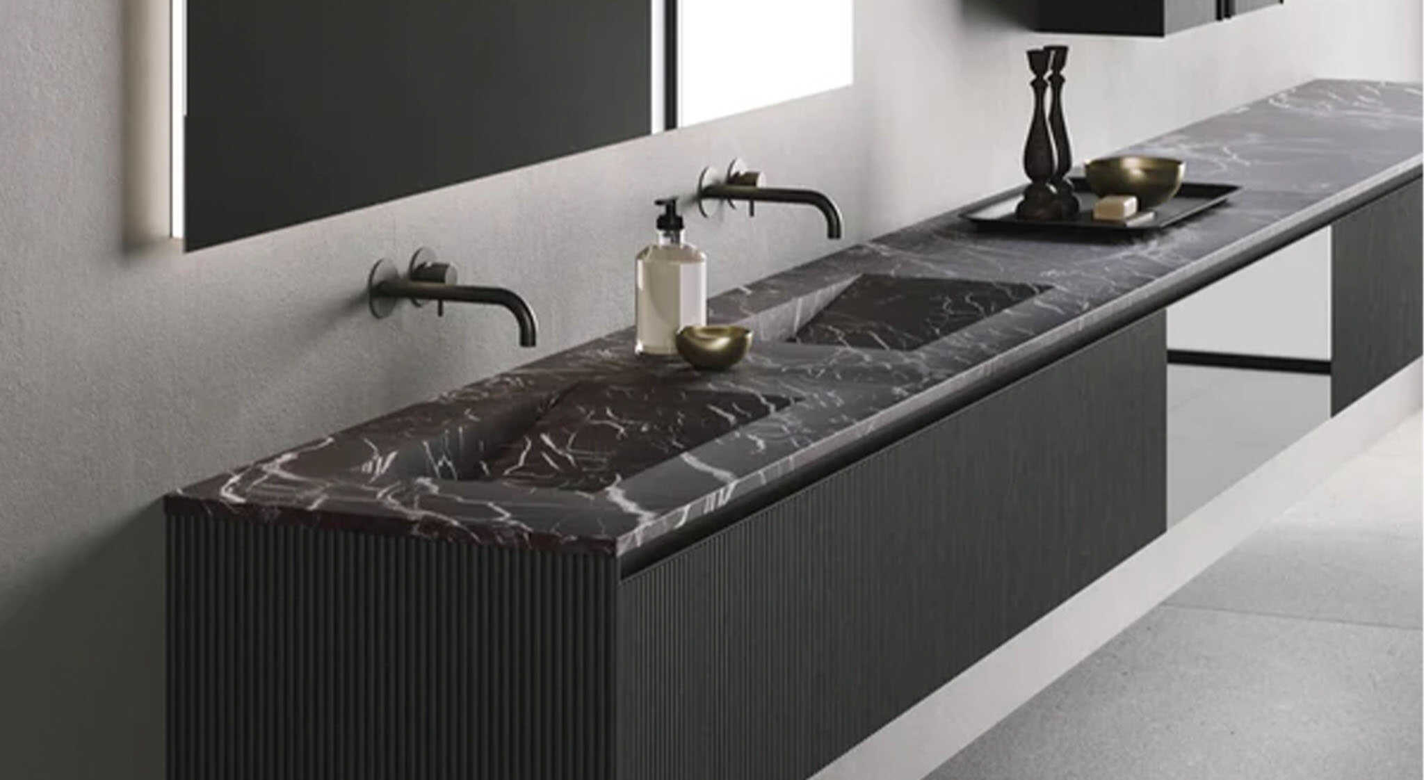 Zwarte badkamer wastafel met marmeren blad en dubbele kranen, modern en stijlvol design voor een luxe badkamerinterieur.